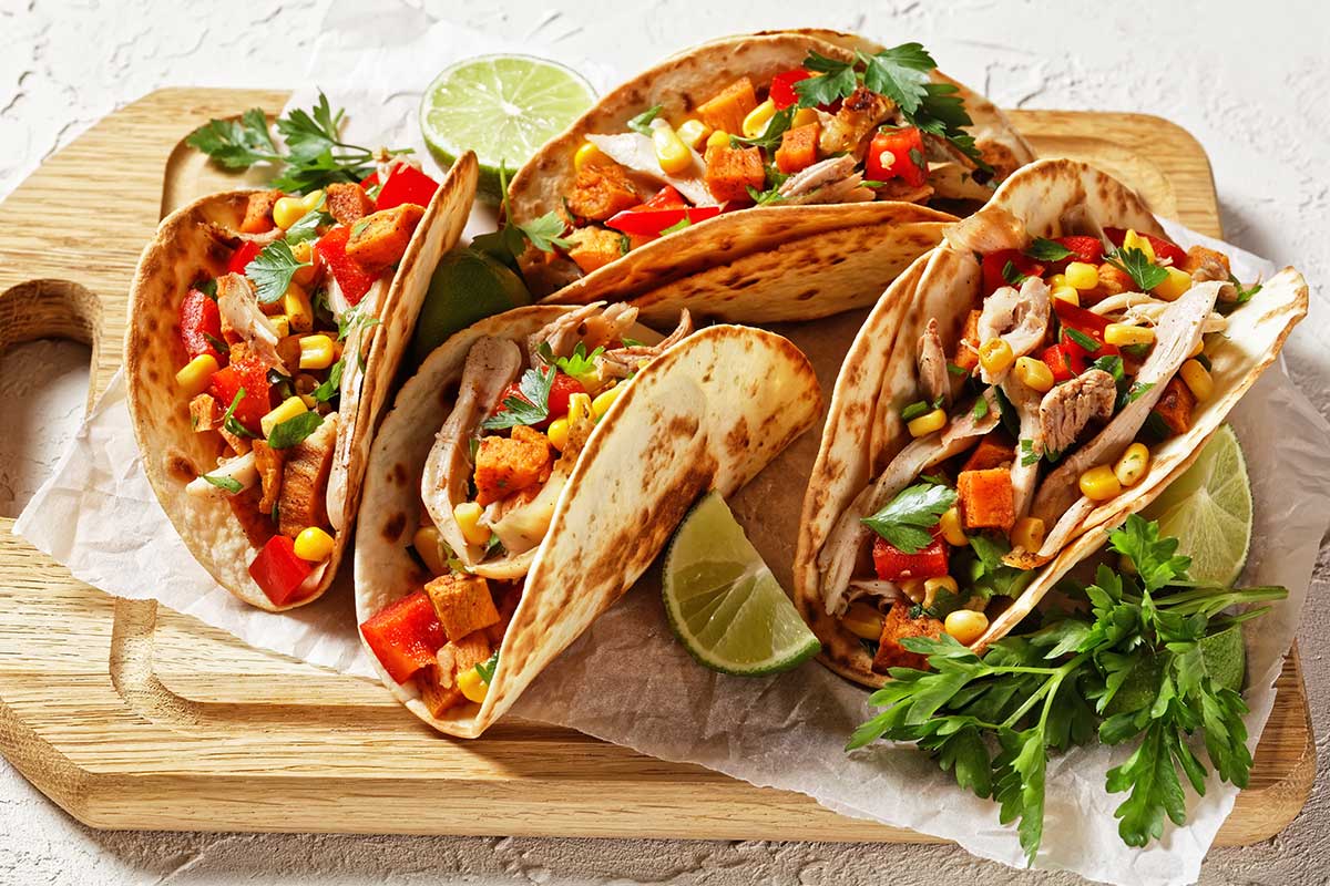 tacos with grilled chicken meat and veggies